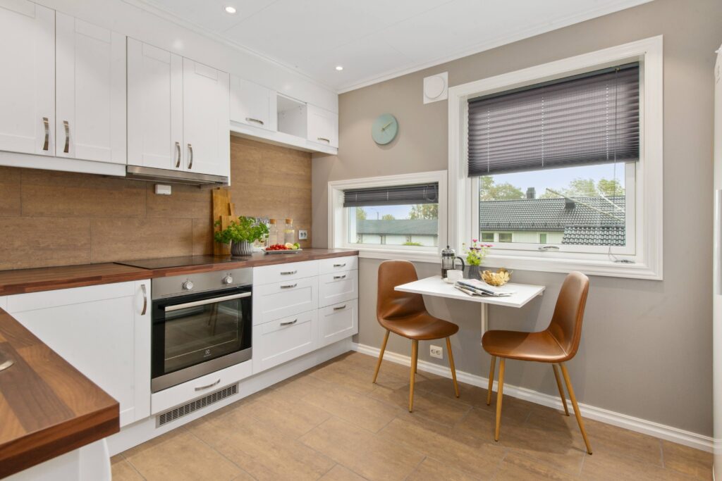 Kitchen with small dining area.